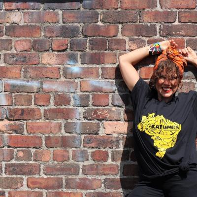 woman leaning on wall